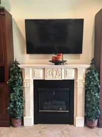 Jensen Portable Fireplace and Samsung TV