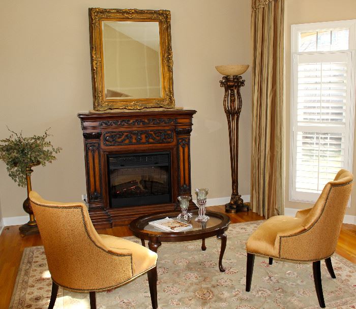 This gorgeous rug, table, mirror, pedestal and floral and two chairs are being sold, however that cute lamp was given to a family member.  so sorry!