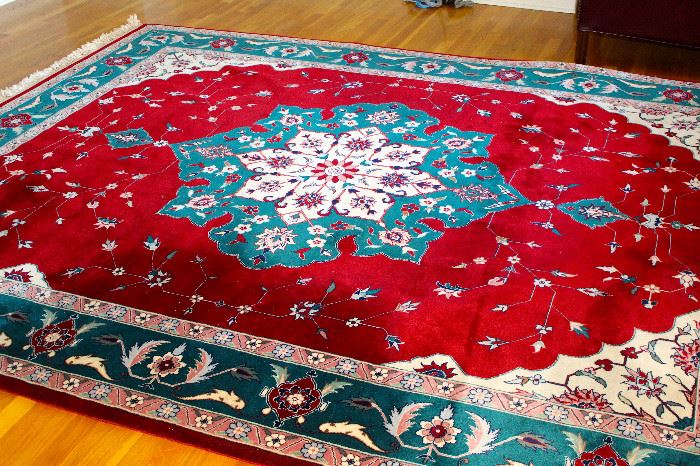 This rug is in the study and I have always loved the red and turquoise together - it's timeless.