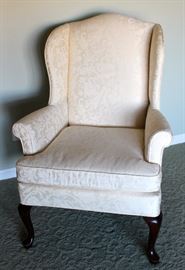 Upholstered wing back chair in perfect condition
