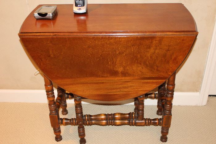 Drop Leaf Table.  Nice when you need extra space for a big dinner or game table...
