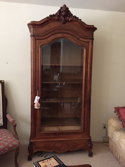 Antique armoire converted to a glass front curio cabinet with lighting.  94" x 39" x 18"