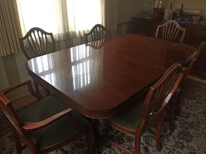 Mahogany dining table with 6 chairs and leaves