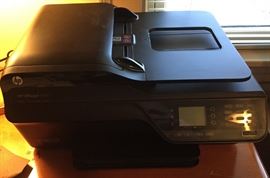 HP OfficeJet 4610 with booklet and spare ink cartridges