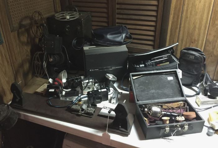 Assortment of movie and still camera equipment from 1930's to the 90's