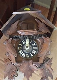 Wood carved cuckoo clock