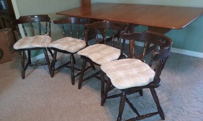 Four matching captain's chairs