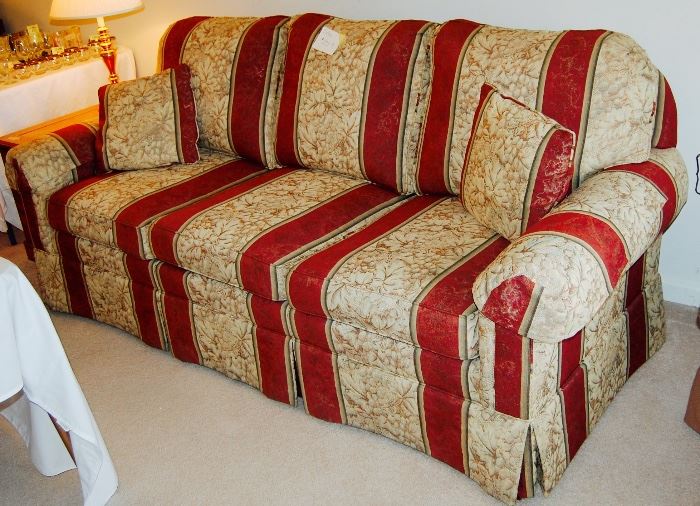 THIS SOFA IS IN BRAND NEW CONDITION