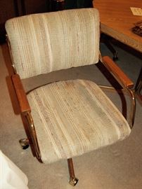 ONE OF THE FOUR COMFORTABLE CHAIRS