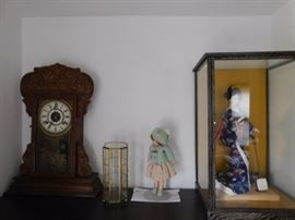 Antique clock and Geisha doll in case