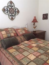 2 Tommy Bahama nightstands with tropical lamps.  Comforter purchased at Nordstroms. Comes with matching Shams, 3 velour pillows.  Gorgeous Wood and metal wall art