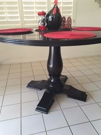 Gorgeous round pedestal table by Stanley, placemats, ceramic chicken, cast iron napkin holder, salt and pepper shaker