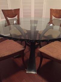 Gorgeous 3 1/2" thick glass zig zagged edge table with 5 teak wood chairs.  UNBELIEVABLE TABLE with solid brass base!