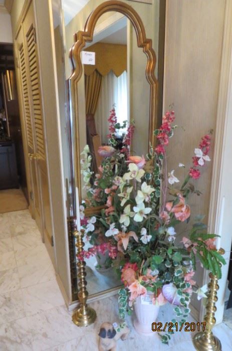 Wall Mirror, Tall Candlesticks, Flower Arrangement