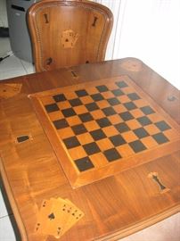 Custom Inlay game table from Masins.  Table with 2 chairs