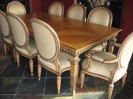 Amazing High-End Dining Table and Chairs (matches large Buffet).  Table measures 90 inches long and 48 inches wide (plus a leaf) with 8 chairs.  Chairs will need to be reupholstered, table top needs some TLC. 