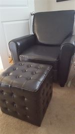 Pair of two leather-like reclining club chairs and ottoman.