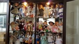 Numerous collectible porcelain dolls