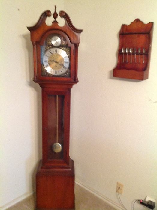 Grandfather clock and spoon holder.