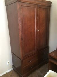 Wardrobe cabinet (shelves can be added but it currently has a closet rod)