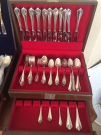 12 place settings with serving pieces