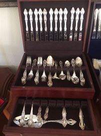 12 place settings with serving pieces