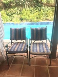 2 of 4 matching patio chairs