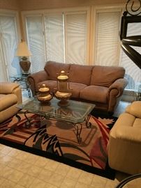 One of matching Suede Sofa's form Haverty's. With Leather theater recliner seats, and 2 iron side tables and coffee table