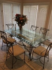 Wrought Iron indoor or outdoor Glass top table with 6 chairs