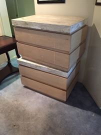 Kreiss Modern marble top night stands.  Put side by side, makes a nice dresser