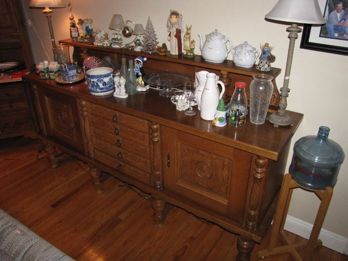 A buffet cabinet, along with a few other items.