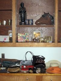 Downstairs Main Bedroom Right Perfume bottles, Paper Mache Horse head, Budda, Purse's