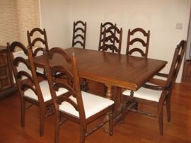 Formal Dining Room Table with Eight Chairs and Two Leaves with Table Top Pads....