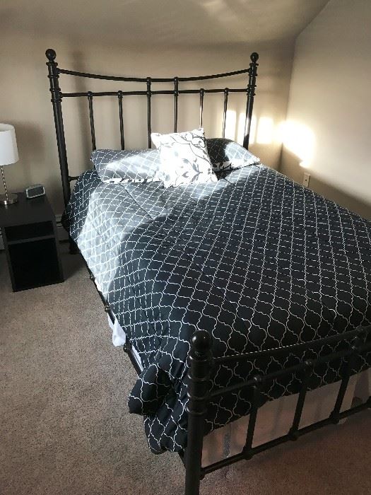 iron-wrought queen bed