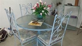 Round glass table - 4 chairs