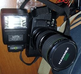 CANON PC1 WITH SUNPAK ANDLENS $85