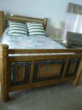 Master queen-sized bedroom with matching dresser with mirror and armoire (mattress and boxspring with frame)