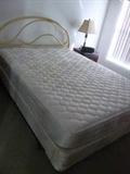Queen mattress and boxspring with gold headboard