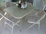 Patio chairs and table (4)