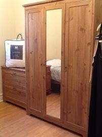 Wardrobe and set of drawers in as new condition.