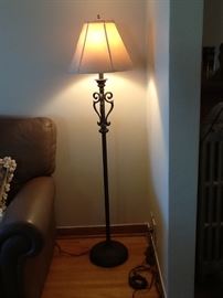 A set of two bronze floor lamps, hand made.