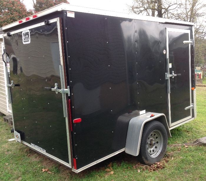 Side view of the Cargo Craft Trailer that is 6' wide x 12' long x 6' high. Just right for the person who is looking to transport small to large items and is in need of climate control. 