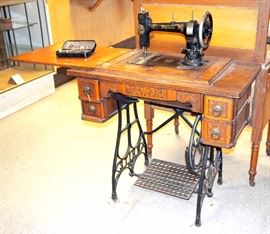 White Co Rotary Treadle Sewing Machine in Carved Sewing Table With Cast Iron Legs and Original Casters #1188402, 29"T x 32.25"W x 17"D
