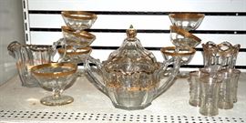 Gold Trimmed Glass Ware Includes: Sherbets Qty 7, Covered Candy Dish, Creamer & Sugar, Vase and Shot Glasses Qty 5