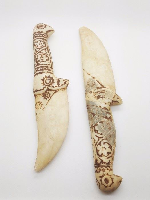 3-A pair of ancient Middle Eastern phoenix head daggers, carved alabaster with Persian decoration motif. 8"Lx 2"W and 9"L x 2"W (broken tip)