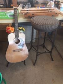 decorative guitar, bar stool