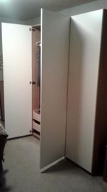 Ikea wardrobe.  This has been dismantled for easy shopping, and all parts are accounted for.  Three doors and a couple of drawers.