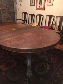 Tiger Oak Dining Table with HUGE lion paw feet. Circa 1900.