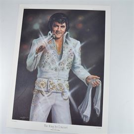 After Micael Duval Finnell Limited Edition Print "The King in Concert": A limited edition offset lithograph print of The King in Concert after Michael Duval Finnell. This piece is a reproduction of an oil painting featuring Elvis Presley in a sparkling white outfit, holding a microphone singing in concert. The print is numbered 678 out of 1000 and includes a certificate of authenticity from Frankfort Blue Print, Co. of Frankfort, KY.