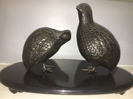 Heavy bird sculpture. What kind of bird is this?